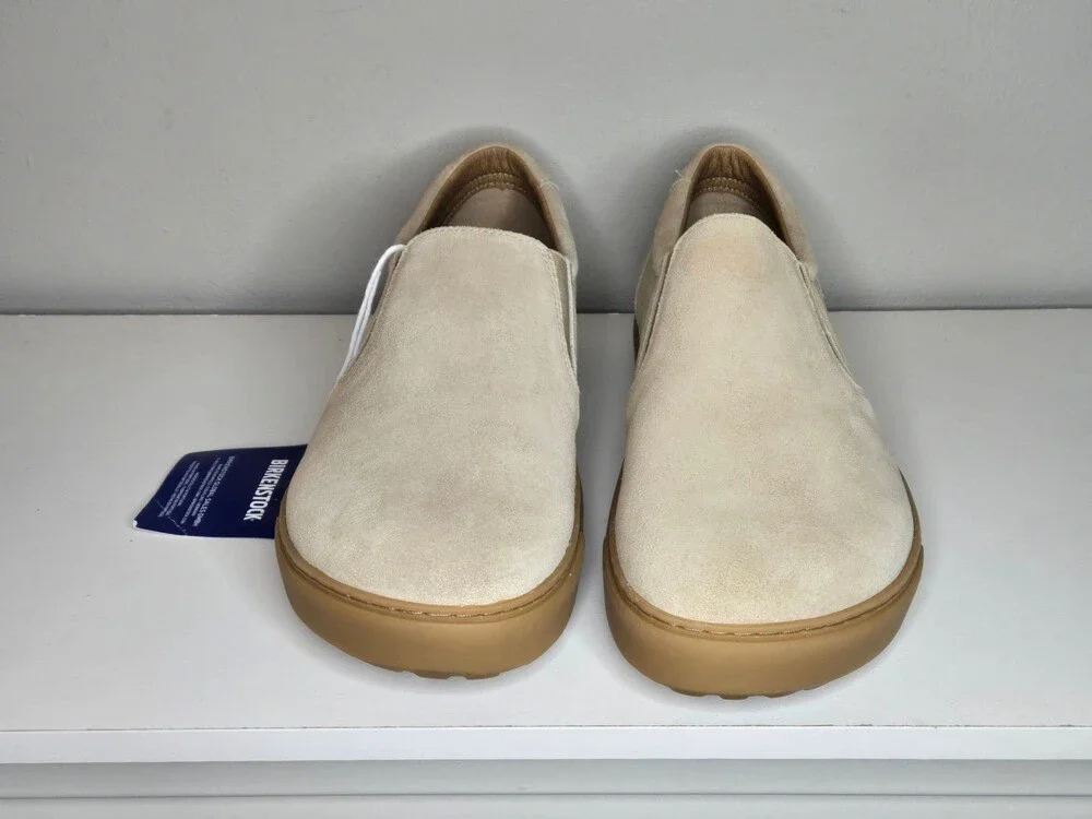 Unisex Birkenstock Oswego Suede Slip-On Shoes in Sandcastle Tan